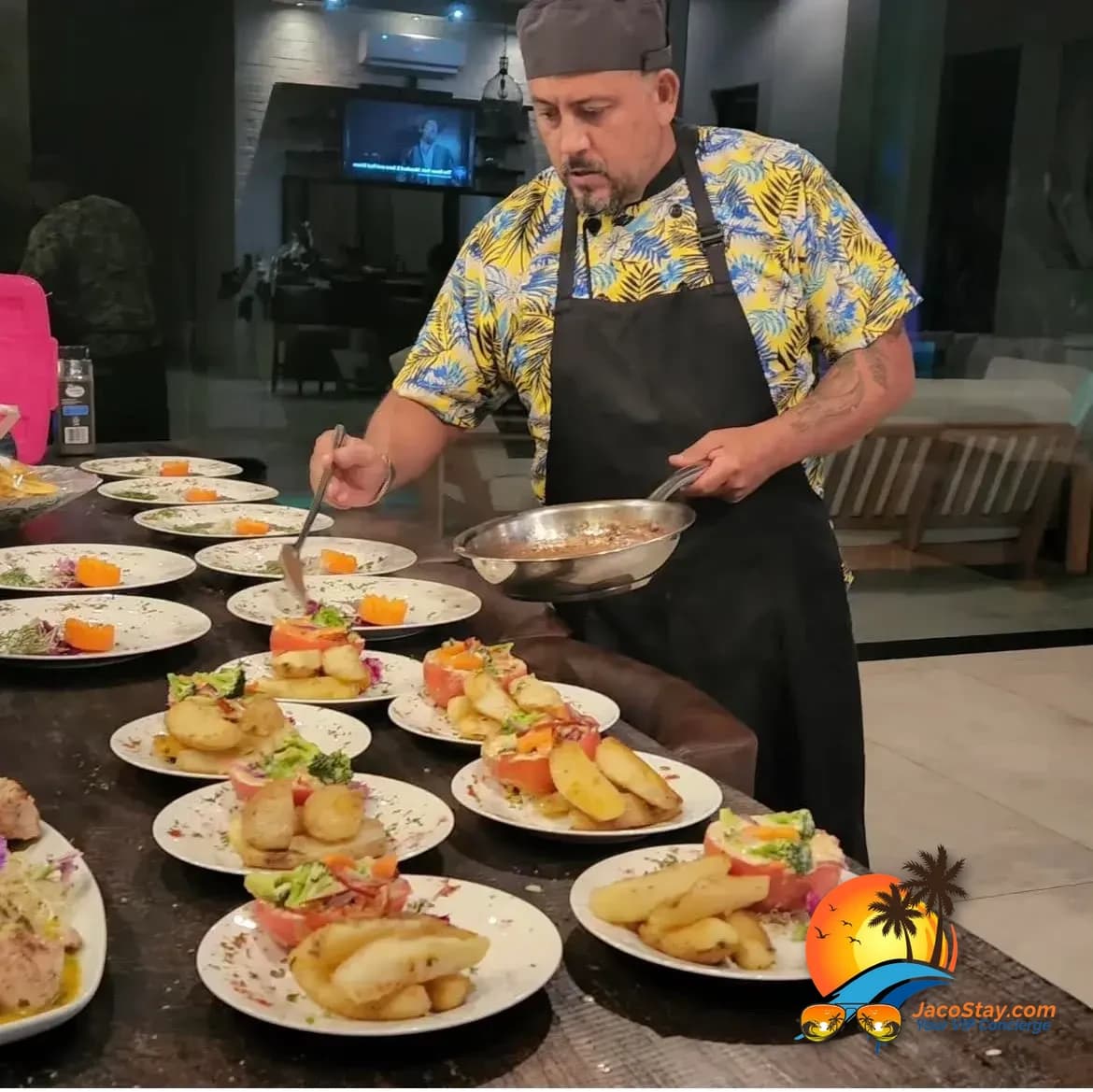 Private chef preparing a candlelit dinner for two in a Costa Rica villa