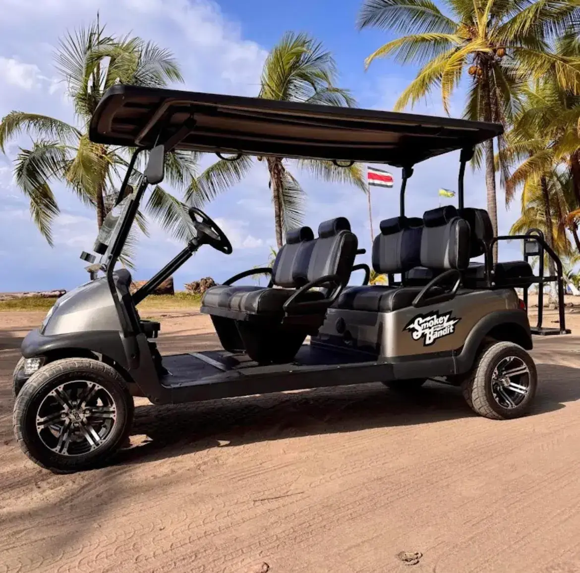Lifted gray 6-passenger golf cart with beach buggy styling in Costa Rica