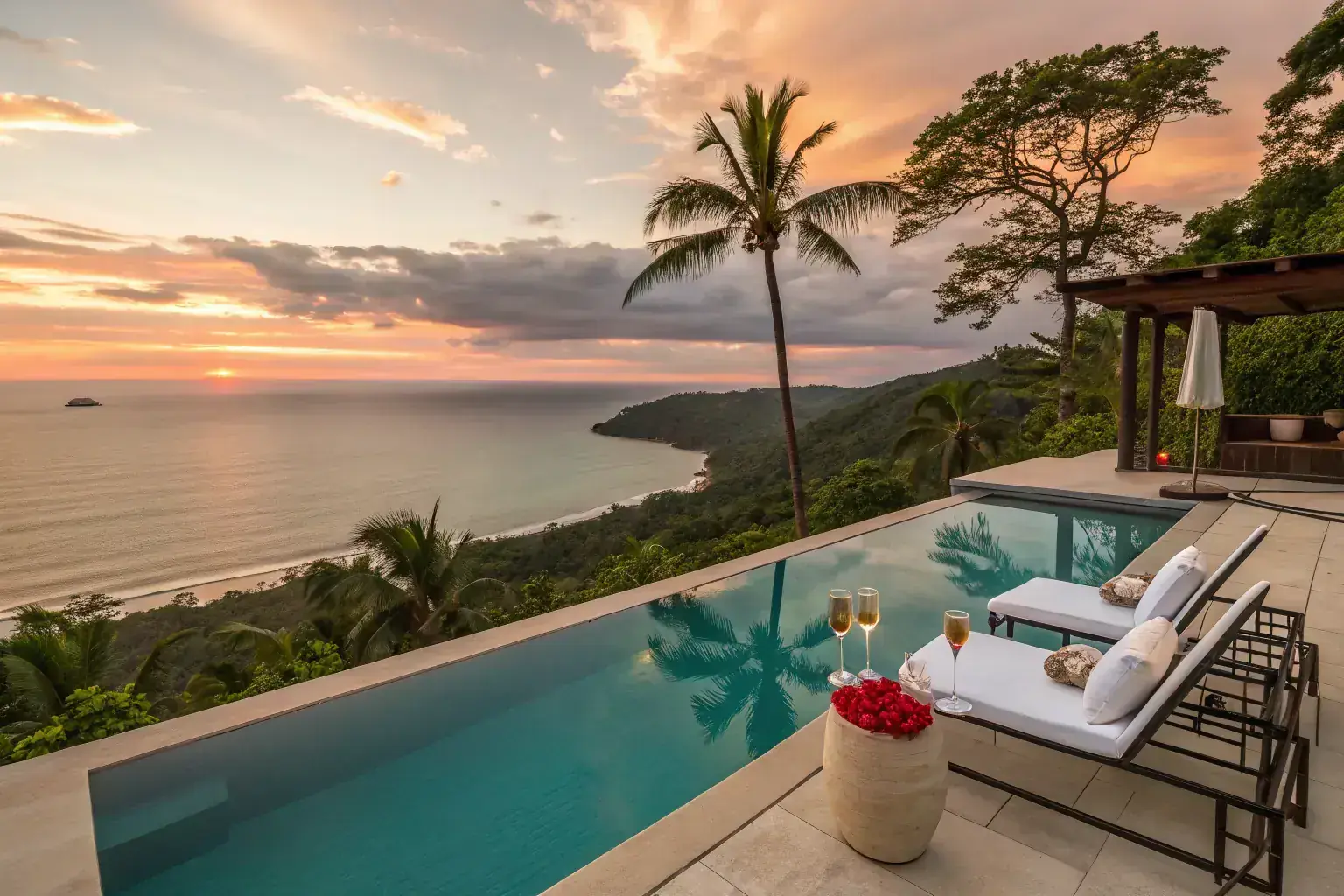 Luxury infinity pool villa with Pacific Ocean view at sunset - Jaco Costa Rica honeymoon