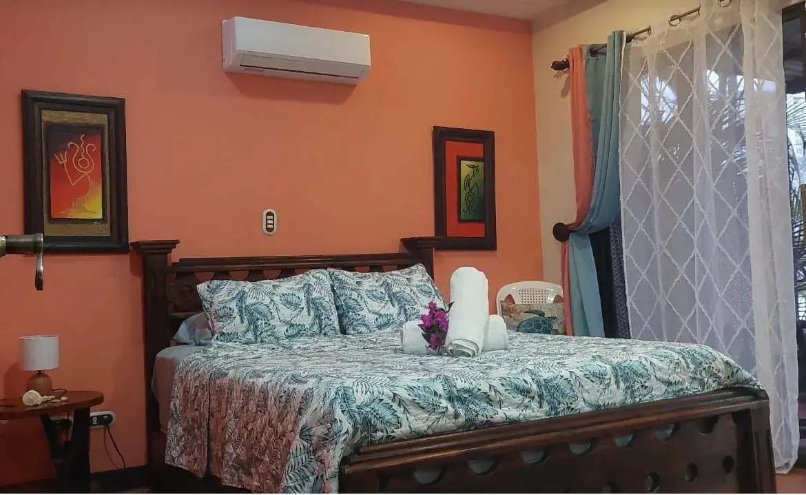 La Flor bedroom with tropical decor
