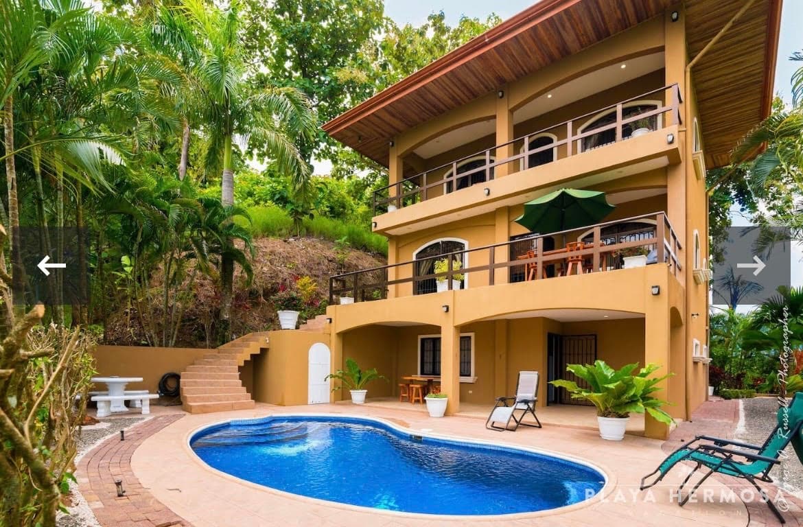 Villa Surfside luxury tropical villa with kidney-shaped pool and lush garden in Playa Hermosa