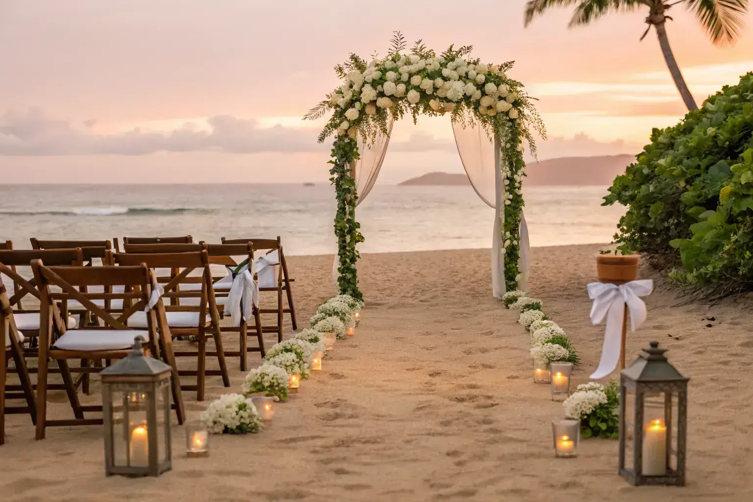 Romantic beach vow renewal ceremony setup with floral arch at sunset in Costa Rica